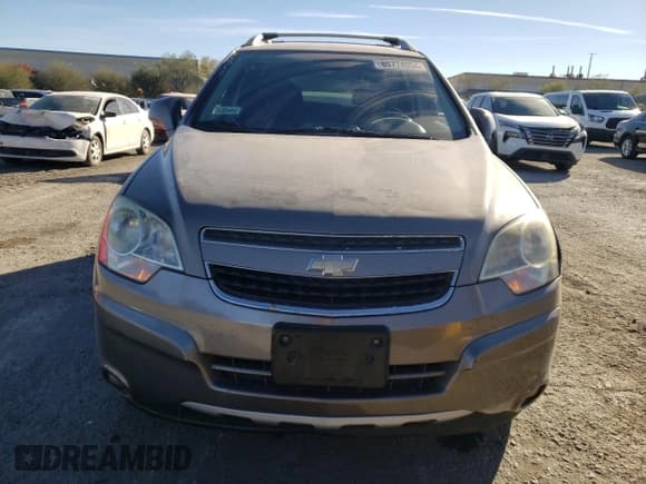 ✅ 2012 Chevrolet Captiva Sport LT • VIN: 3GNAL3E58CS547863 • Lot: 80774954. Wystawiony na Copart z przebiegiem 167 793 mil. Bezpłatny archiwum sprzedaży aukcyjnych z USA i szczegółowy raport historii pojazdu na DreamBid. Zdjęcie 5.
