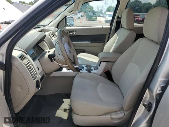 2009 Mercury Mariner с VIN 4M2CU81G69KJ03673, выставлен на аукционе Copart как лот 63932915 с пробегом 71 072 миль миль и Списание • Salvage title. История ставок и продаж доступна на DreamBid. Изображение 7.