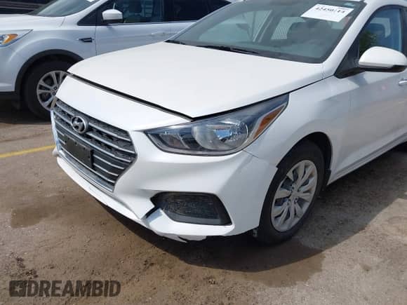 2019 Hyundai Accent SE z VIN 3KPC24A35KE060275, wystawiony jako IAAI lot #42450114 z przebiegiem 14 224 mil mil oraz . Historia ofert i sprzedaży dostępna na DreamBid. Obrazek 6.
