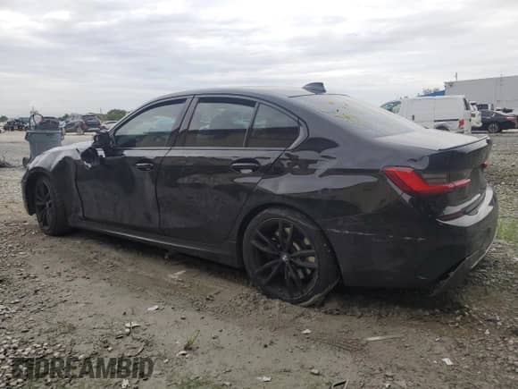 2021 BMW 3 Series M340i with VIN 3MW5U7J02M8B51836, listed as a Copart auction lot 80948675 with 79,331 mi miles and Salvage title. Bid and sale history available at DreamBid. Image 2.