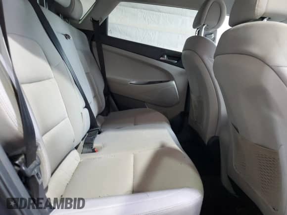 2018 Hyundai Tucson SE z VIN KM8J2CA42JU647815, wystawiony jako Copart lot #69262955 z przebiegiem 72 662 mil mil oraz Szkoda całkowita • Salvage title. Historia ofert i sprzedaży dostępna na DreamBid. Obrazek 11.