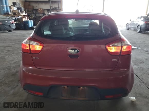 ✅ 2014 Kia Rio LX • VIN: KNADM5A32E6409601 • Лот: 90831335. Опубликован ранее на Copart с пробегом 39 657 миль. Бесплатный доступ к архиву аукционных продаж из США и подробный отчёт об истории автомобиля на DreamBid. Изображение 6.