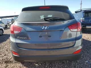 2015 Hyundai Tucson SE z VIN KM8JU3AG2FU966580, wystawiony jako Copart lot #50150694 z przebiegiem 35 143 mil mil oraz Szkoda całkowita • Salvage title. Historia ofert i sprzedaży dostępna na DreamBid. Obrazek 6.