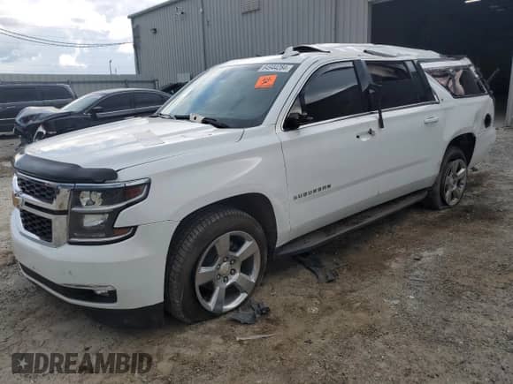 2017 Chevrolet Suburban LT z VIN 1GNSCHKC2HR299687, wystawiony jako Copart lot #64944284 z przebiegiem Nie podano mil oraz Szkoda całkowita • Salvage title. Historia ofert i sprzedaży dostępna na DreamBid. Obrazek 1.