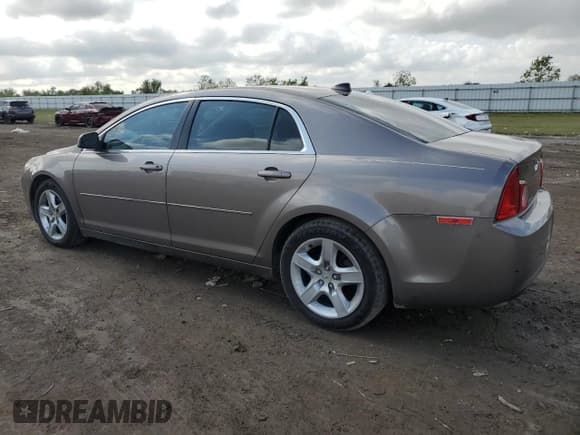 ✅ 2012 Chevrolet Malibu 1LS • VIN: 1G1ZB5E07CF185195 • Lot: 79741894. Listed on Copart with 126,140 mi. Free auction sales archive from the USA and detailed vehicle history report at DreamBid. Image 2.