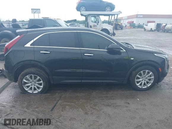 ✅ 2023 Cadillac XT4 AWD Luxury • VIN: 1GYFZBR40PF200976 • Lot: 39503922. Listed on IAAI with 9,403 mi. Free auction sales archive from the USA and detailed vehicle history report at DreamBid. Image 12.
