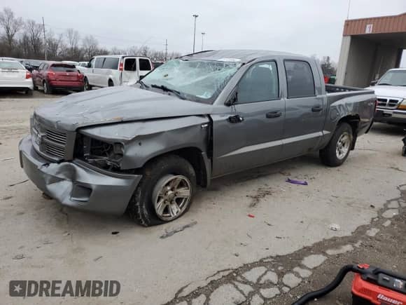 2010 Dodge Dakota SXT with VIN 1D7CW3GP7AS176121, listed as a Copart auction lot 85169354 with Not provided miles and Salvage title. Bid and sale history available at DreamBid. Image 1.