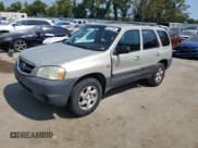 ✅ 2004 Mazda Tribute DX • VIN: 4F2YZ02B74KM13874 • Лот: 65422864. Опубликован ранее на Copart с пробегом 288 215 миль. Бесплатный доступ к архиву аукционных продаж из США и подробный отчёт об истории автомобиля на DreamBid. Изображение 1.