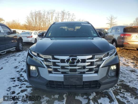 2022 Hyundai Santa Cruz SEL Premium с VIN 5NTJDDAF8NH015716, выставлен на аукционе Copart как лот 87529445 с пробегом 18 194 миль миль и Списание • Salvage title. История ставок и продаж доступна на DreamBid. Изображение 5.