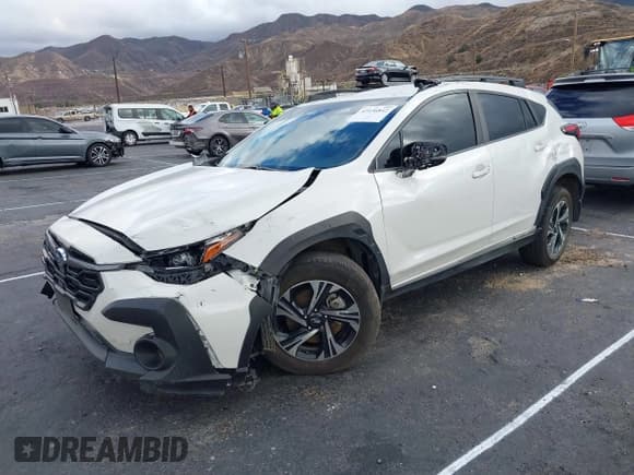 ✅ 2024 Subaru Crosstrek Premium • VIN: JF2GUADC7RH203626 • Лот: 43436842. Опубликован ранее на IAAI с пробегом 56 839 миль. Бесплатный доступ к архиву аукционных продаж из США и подробный отчёт об истории автомобиля на DreamBid. Изображение 2.