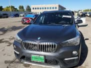 ✅ 2019 BMW X1 sDrive28i • VIN: WBXHU7C57K5L11781 • Lot: 84984175. Wystawiony na Copart z przebiegiem 96 925 mil. Bezpłatny archiwum sprzedaży aukcyjnych z USA i szczegółowy raport historii pojazdu na DreamBid. Zdjęcie 14.