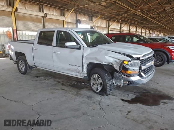 ✅ 2018 Chevrolet Silverado 1500 LT • VIN: 3GCPCREC5JG520186 • Lot: 93995705. Wystawiony na Copart z przebiegiem 123 439 mil. Bezpłatny archiwum sprzedaży aukcyjnych z USA i szczegółowy raport historii pojazdu na DreamBid. Zdjęcie 4.