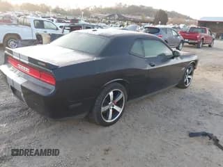 ✅ 2012 Dodge Challenger SRT-8 392 • VIN: 2C3CDYCJ5CH121521 • Lot: 40747392. Wystawiony na IAAI z przebiegiem 147 725 mil. Bezpłatny archiwum sprzedaży aukcyjnych z USA i szczegółowy raport historii pojazdu na DreamBid. Zdjęcie 4.