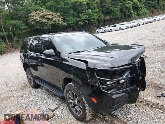 2023 Chevrolet Tahoe Commercial z VIN 1GNSKLED3PR157406, wystawiony jako Copart lot #58371095 z przebiegiem 27 083 mil mil oraz Szkoda całkowita • Salvage title. Historia ofert i sprzedaży dostępna na DreamBid. Obrazek 4.