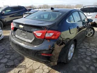 ✅ 2018 Chevrolet Cruze LT • VIN: 1G1BE5SM7J7108687 • Lot: 73537832. Listed on Copart with 87,270 mi. Free auction sales archive from the USA and detailed vehicle history report at DreamBid. Image 3.