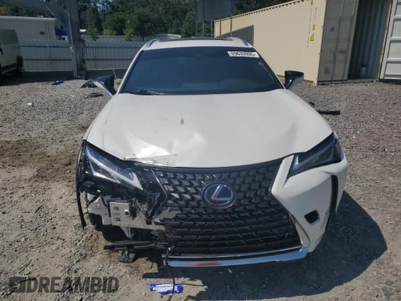 ✅ 2021 Lexus UX 250h • VIN: JTHP9JBH1M2041128 • Лот: 69633995. Опубликован ранее на Copart с пробегом 61 092 миль. Бесплатный доступ к архиву аукционных продаж из США и подробный отчёт об истории автомобиля на DreamBid. Изображение 5.
