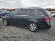 ✅ 2014 Honda Odyssey EX-L • VIN: 5FNRL5H66EB014143 • Lot: 90998015. Listed on Copart with 137,281 mi. Free auction sales archive from the USA and detailed vehicle history report at DreamBid. Image 2.