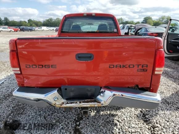 2003 Dodge Dakota SLT with VIN 1D7HL42N33S328375, listed as a Copart auction lot 73176894 with 219,093 mi miles and Salvage title. Bid and sale history available at DreamBid. Image 6.