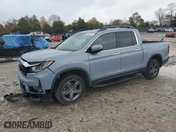 ✅ 2022 Honda Ridgeline RTL-E • VIN: 5FPYK3F75NB038052 • Lot: 90275235. Listed on Copart with 73,543 mi. Free auction sales archive from the USA and detailed vehicle history report at DreamBid. Image 1.