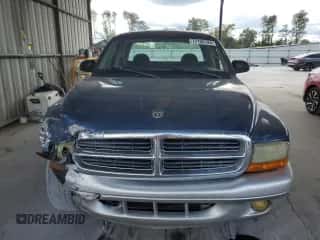 2004 Dodge Dakota SLT z VIN 1D7GL42N14S676687, wystawiony jako Copart lot #72150124 z przebiegiem 162 913 mil mil oraz Szkoda całkowita • Salvage title. Historia ofert i sprzedaży dostępna na DreamBid. Obrazek 5.