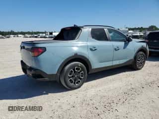 2023 Hyundai Santa Cruz SEL Premium z VIN 5NTJDDAF5PH055478, wystawiony jako Copart lot #49303904 z przebiegiem 2 690 mil mil oraz Szkoda całkowita • Salvage title. Historia ofert i sprzedaży dostępna na DreamBid. Obrazek 3.