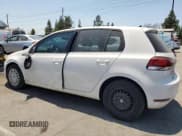 ✅ 2014 Volkswagen Golf • VIN: WVWDB7AJ0EW008941 • Lot: 64963465. Listed on Copart with 107,410 mi. Free auction sales archive from the USA and detailed vehicle history report at DreamBid. Image 2.