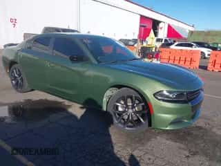 2022 Dodge Charger SXT with VIN 2C3CDXBG5NH202361, listed as a IAAI auction lot 43406992 with 34,449 mi miles and . Bid and sale history available at DreamBid. Image 1.