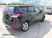 ✅ 2015 Ford Escape SE • VIN: 1FMCU0G91FUB32395 • Lot: 43521911. Listed on IAAI with 84,750 mi. Free auction sales archive from the USA and detailed vehicle history report at DreamBid. Image 4.