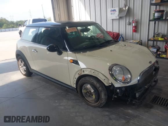 ✅ 2013 MINI Hardtop • VIN: WMWSU3C5XDT690508 • Lot: 43262131. Listed on IAAI with 52,535 mi. Free auction sales archive from the USA and detailed vehicle history report at DreamBid. Image 1.