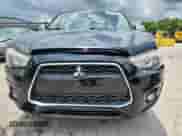 2015 Mitsubishi Outlander ES with VIN 4A4AP3AU7FE007230, listed as a Copart auction lot 62764425 with 133,871 mi miles and Salvage title. Bid and sale history available at DreamBid. Image 5.