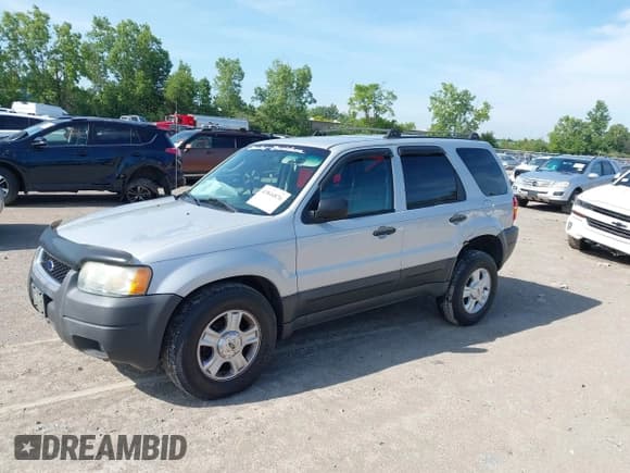 ✅ 2004 Ford Escape XLT • VIN: 1FMYU931X4KB19082 • Lot: 42844876. Listed on IAAI with 86,428 mi. Free auction sales archive from the USA and detailed vehicle history report at DreamBid. Image 2.