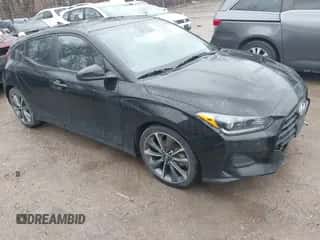 2019 Hyundai Veloster Premium z VIN KMHTG6AF0KU019038, wystawiony jako IAAI lot #41236750 z przebiegiem 83 164 mil mil oraz . Historia ofert i sprzedaży dostępna na DreamBid. Obrazek 1.