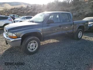 ✅ 2004 Dodge Dakota SLT • VIN: 1D7HG48N14S509987 • Lot: 43283745. Wystawiony na Copart z przebiegiem Nie podano. Bezpłatny archiwum sprzedaży aukcyjnych z USA i szczegółowy raport historii pojazdu na DreamBid. Zdjęcie 1.