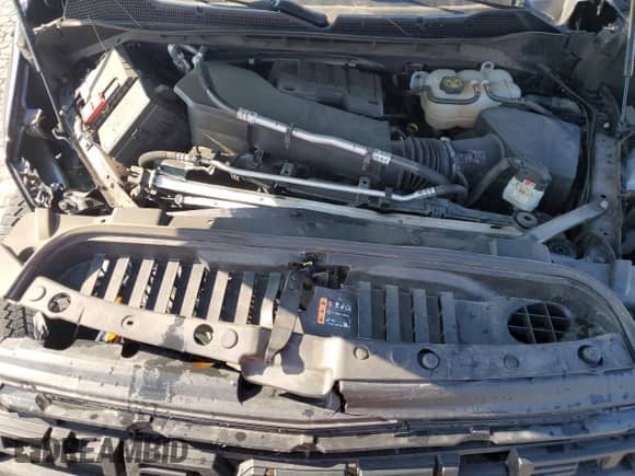 2024 Chevrolet Silverado 1500 Custom Trail Boss z VIN 3GCPDCEK3RG154533, wystawiony jako Copart lot #80881115 z przebiegiem 17 821 mil mil oraz Szkoda całkowita • Salvage title. Historia ofert i sprzedaży dostępna na DreamBid. Obrazek 11.