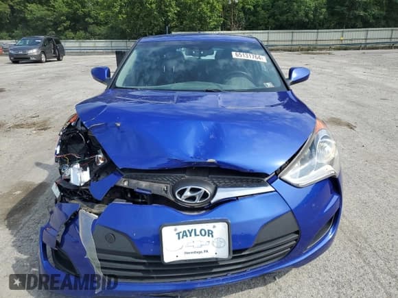 ✅ 2014 Hyundai Veloster • VIN: KMHTC6ADXEU194525 • Lot: 65131764. Wystawiony na Copart z przebiegiem 124 560 mil. Bezpłatny archiwum sprzedaży aukcyjnych z USA i szczegółowy raport historii pojazdu na DreamBid. Zdjęcie 5.