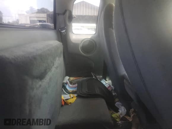 1999 Dodge Dakota SLT z VIN 1B7GL22X0XS145128, wystawiony jako Copart lot #64959364 z przebiegiem 96 047 mil mil oraz Szkoda całkowita • Salvage title. Historia ofert i sprzedaży dostępna na DreamBid. Obrazek 10.