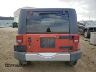 ✅ 2009 Jeep Wrangler Sahara • VIN: 1J4FA54189L723415 • Лот: 91922975. Опубликован ранее на Copart с пробегом 229 520 миль. Бесплатный доступ к архиву аукционных продаж из США и подробный отчёт об истории автомобиля на DreamBid. Изображение 6.
