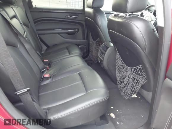 ✅ 2012 Cadillac SRX • VIN: 3GYFNGE30CS630633 • Lot: 42649900. Listed on IAAI with 141,946 mi. Free auction sales archive from the USA and detailed vehicle history report at DreamBid. Image 8.