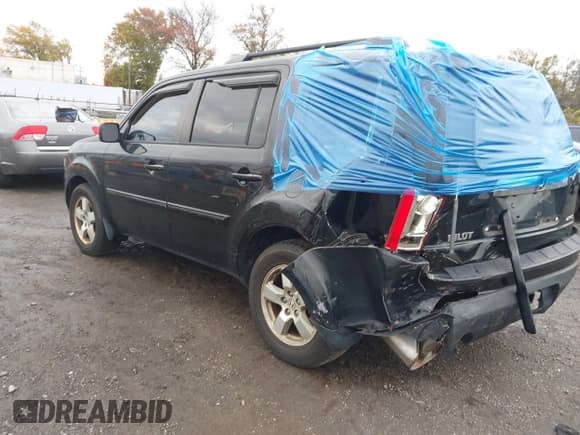 ✅ 2011 Honda Pilot EX-L • VIN: 5FNYF4H58BB095081 • Lot: 43584185. Listed on IAAI with 132,742 mi. Free auction sales archive from the USA and detailed vehicle history report at DreamBid. Image 3.