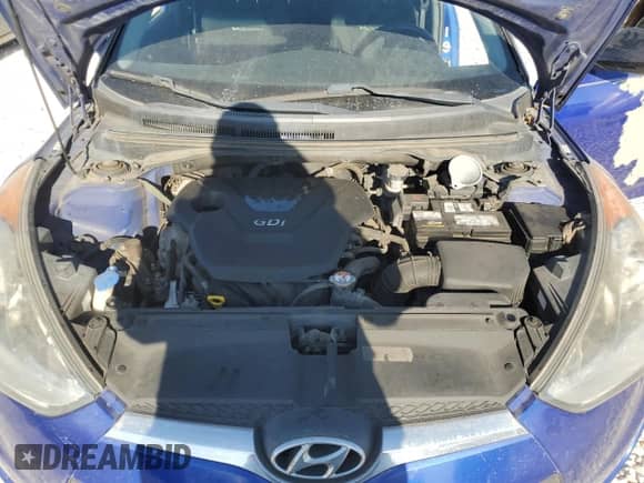 2012 Hyundai Veloster w/Red Int z VIN KMHTC6AD9CU030616, wystawiony jako Copart lot #73885774 z przebiegiem 133 935 mil mil oraz Czysty tytuł • Clean title. Historia ofert i sprzedaży dostępna na DreamBid. Obrazek 11.