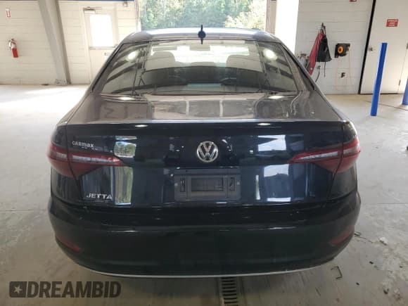 ✅ 2020 Volkswagen Jetta S • VIN: 3VWCB7BU7LM048917 • Lot: 85290915. Listed on Copart with 76,686 mi. Free auction sales archive from the USA and detailed vehicle history report at DreamBid. Image 6.