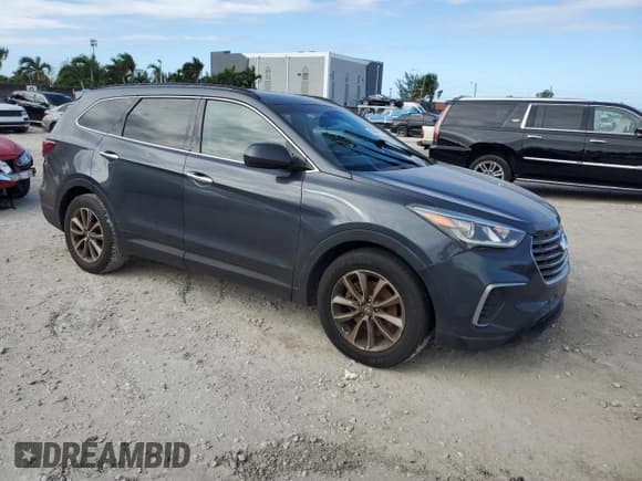 ✅ 2017 Hyundai Santa Fe SE • VIN: KM8SM4HF1HU223631 • Лот: 90484765. Опубликован ранее на Copart с пробегом 107 568 миль. Бесплатный доступ к архиву аукционных продаж из США и подробный отчёт об истории автомобиля на DreamBid. Изображение 4.