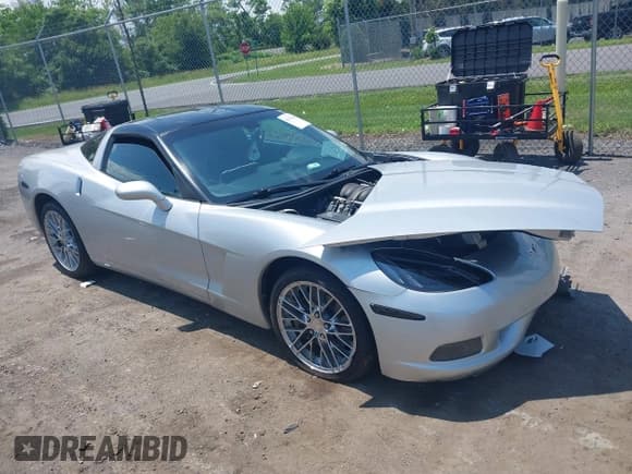 ✅ 2012 Chevrolet Corvette 1LT • VIN: 1G1YA2DW0C5103879 • Lot: 42476956. Listed on IAAI with 79,743 mi. Free auction sales archive from the USA and detailed vehicle history report at DreamBid. Image 1.