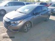 ✅ 2024 Nissan Versa S • VIN: 3N1CN8DV2RL910111 • Lot: 42028037. Listed on IAAI with 12,848 mi. Free auction sales archive from the USA and detailed vehicle history report at DreamBid. Image 2.