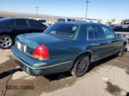 ✅ 2000 Ford Crown Victoria • VIN: 2FAFP73W8YX141772 • Lot: 75394894. Listed on Copart with 190,123 mi. Free auction sales archive from the USA and detailed vehicle history report at DreamBid. Image 3.