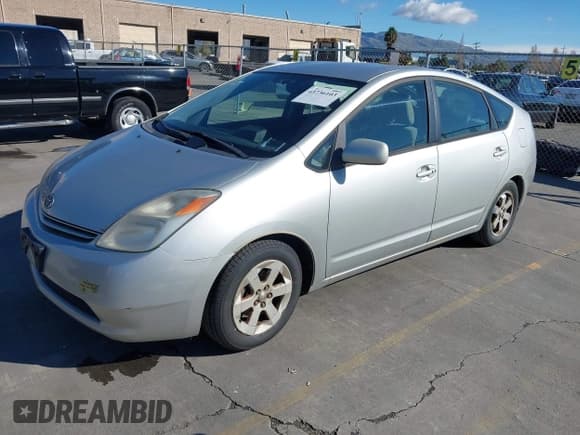 ✅ 2005 Toyota Prius • VIN: JTDKB20U353036014 • Lot: 43736103. Listed on IAAI with 122,145 mi. Free auction sales archive from the USA and detailed vehicle history report at DreamBid. Image 2.