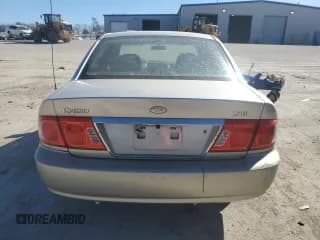 ✅ 2004 Kia Optima LX • VIN: KNAGD128245342583 • Лот: 47021105. Опубликован ранее на Copart с пробегом 130 438 миль. Бесплатный доступ к архиву аукционных продаж из США и подробный отчёт об истории автомобиля на DreamBid. Изображение 6.