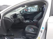 ✅ 2016 Ford Fusion Titanium • VIN: 3FA6P0SU7GR306229 • Lot: 43757752. Listed on IAAI with 146,728 mi. Free auction sales archive from the USA and detailed vehicle history report at DreamBid. Image 5.