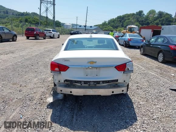 ✅ 2016 Chevrolet Impala LS • VIN: 2G11X5SA9G9128720 • Lot: 42792924. Listed on IAAI with 133,697 mi. Free auction sales archive from the USA and detailed vehicle history report at DreamBid. Image 17.