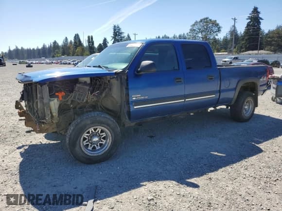 ✅ 2003 Chevrolet Silverado 2500HD LS • VIN: 1GCHK23143F136114 • Lot: 69223494. Wystawiony na Copart z przebiegiem 253 371 mil. Bezpłatny archiwum sprzedaży aukcyjnych z USA i szczegółowy raport historii pojazdu na DreamBid. Zdjęcie 1.